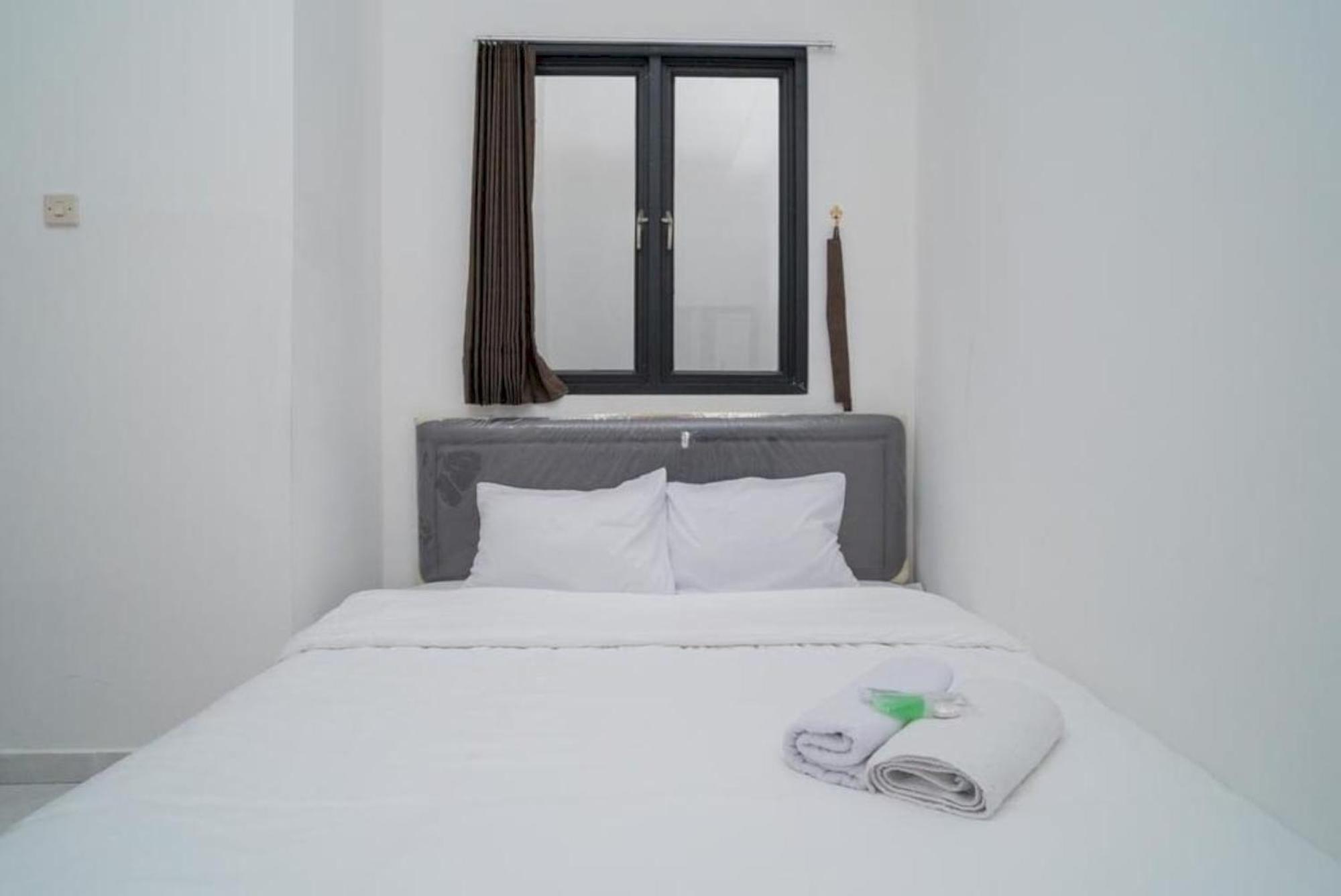 Oyo 94143 Mahagoni House Syariah Hotel 2*