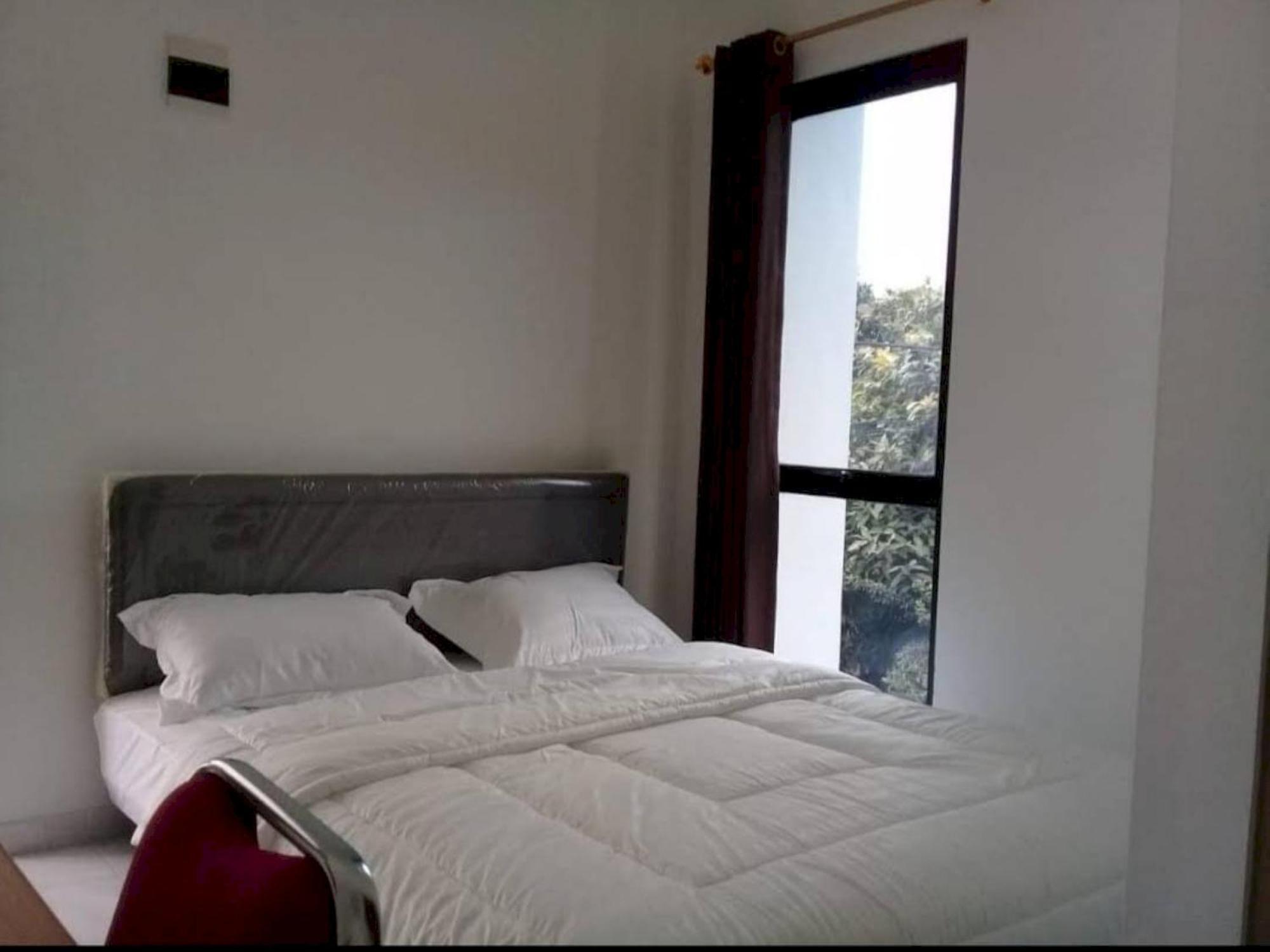 Oyo 94143 Mahagoni House Syariah Hotel 2*